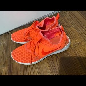 Nike Sneakers light weight. Slightly worn.